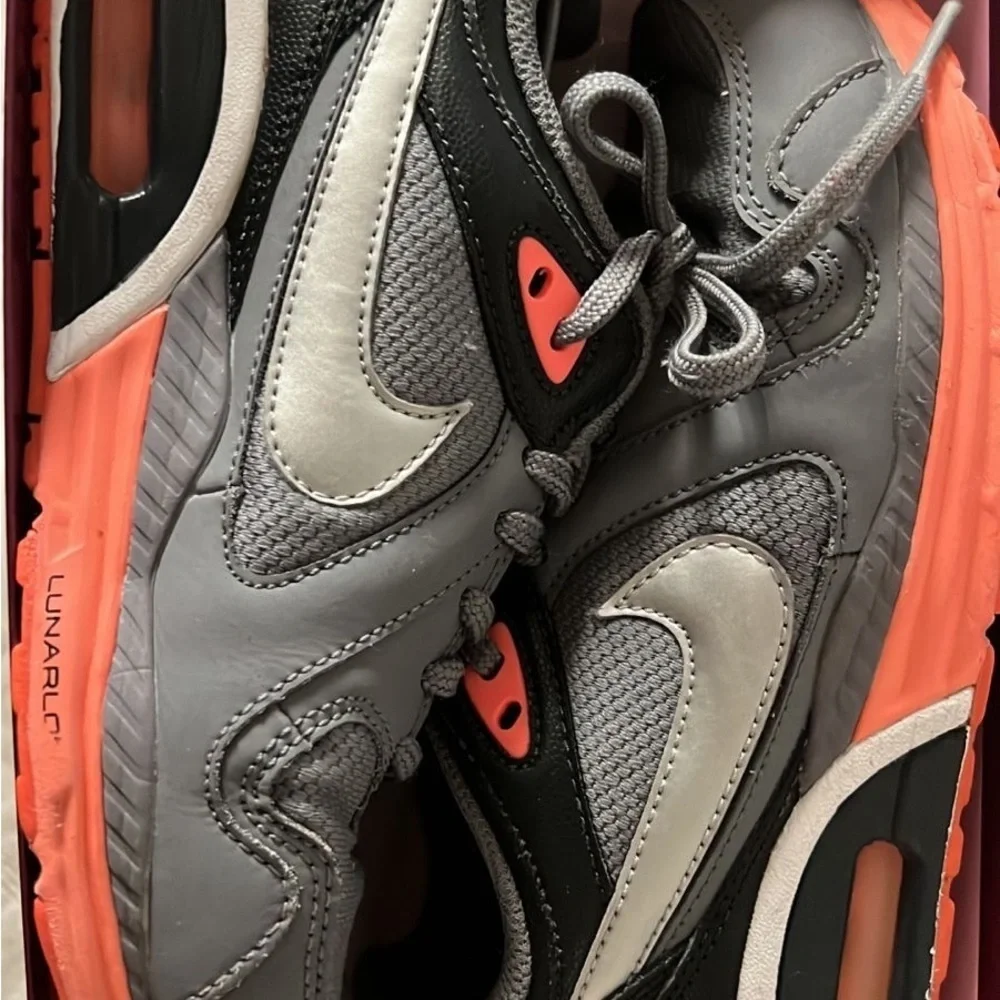 Nike Gray and Orange Athletic Shoes with Air Cushion